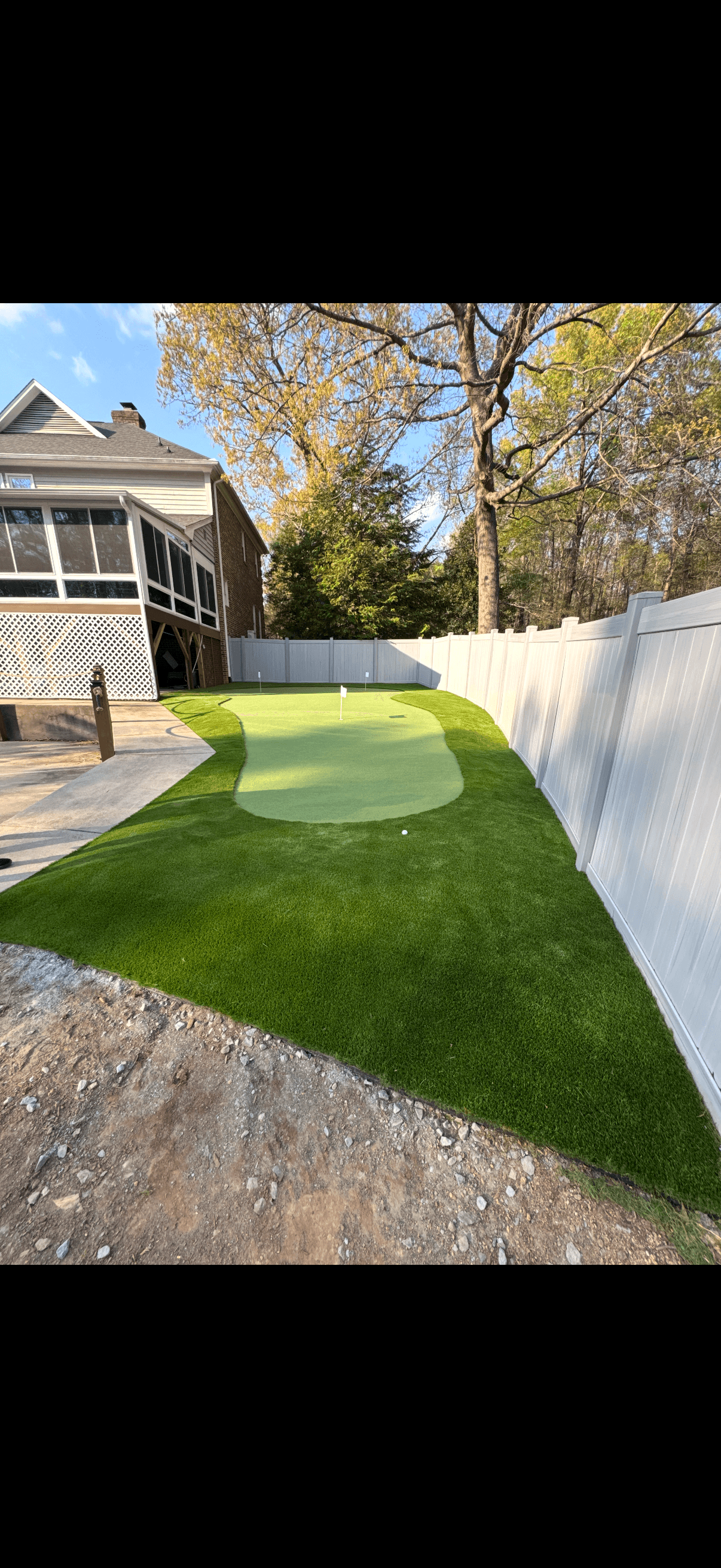 Custom putting green by Compass Hardscapes